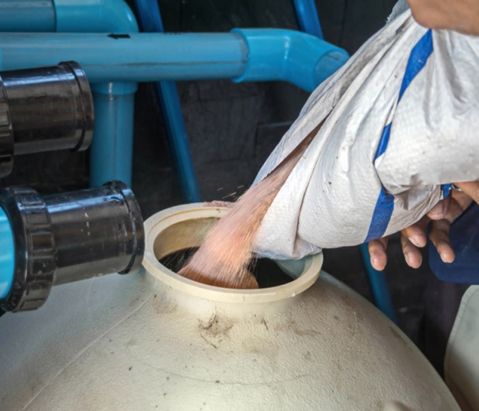 filling-sand-in-sand-filter_oneSHUTTER-oneMEMORY-Shutterstock-copy